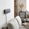 Platt LED-vägglampa Axion med RGB-färgväxling och svart frontpanel, 3000 Kelvin varmvit