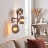 Modern kulformad vägglampa Koyoto med tre runda skärmar i krom, rök och klart