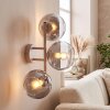 Modern vägglampa Koyoto med tre runda glasskärmar i vertikalt kluster
