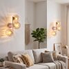 Modern klotvägglampa Koyoto i 2-delat set med tre bärnstensfärgade glasskärmar
