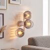 Modern klotvägglampa Koyoto med tre rökfärgade och klara glasskärmar i vertikalt kluster