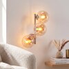Modern vägglampa Gastor med tre amberfärgade glasskärmar i vertikalt kluster