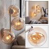 Modern vägglampa Koyoto med tre runda amberfärgade glasskärmar i vertikal rad