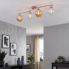 Modern taklampa Gastor med böjd skena och fyra glaskupor i amber och klart glas