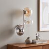 Modern 3-lågig vägglampa Gastor med klotformade glasskärmar i klart, amber och rök