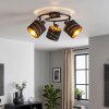 Modern taklampa Alsen med rund spiralform och tre roterbara skärmar i svart och guld