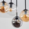 Modern klustertaklampa Gastor med fyra glasskärmar i amber över matbordet