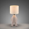Leuchten Direkt bordslampa TED med stiliserad figurfot och beige skärm